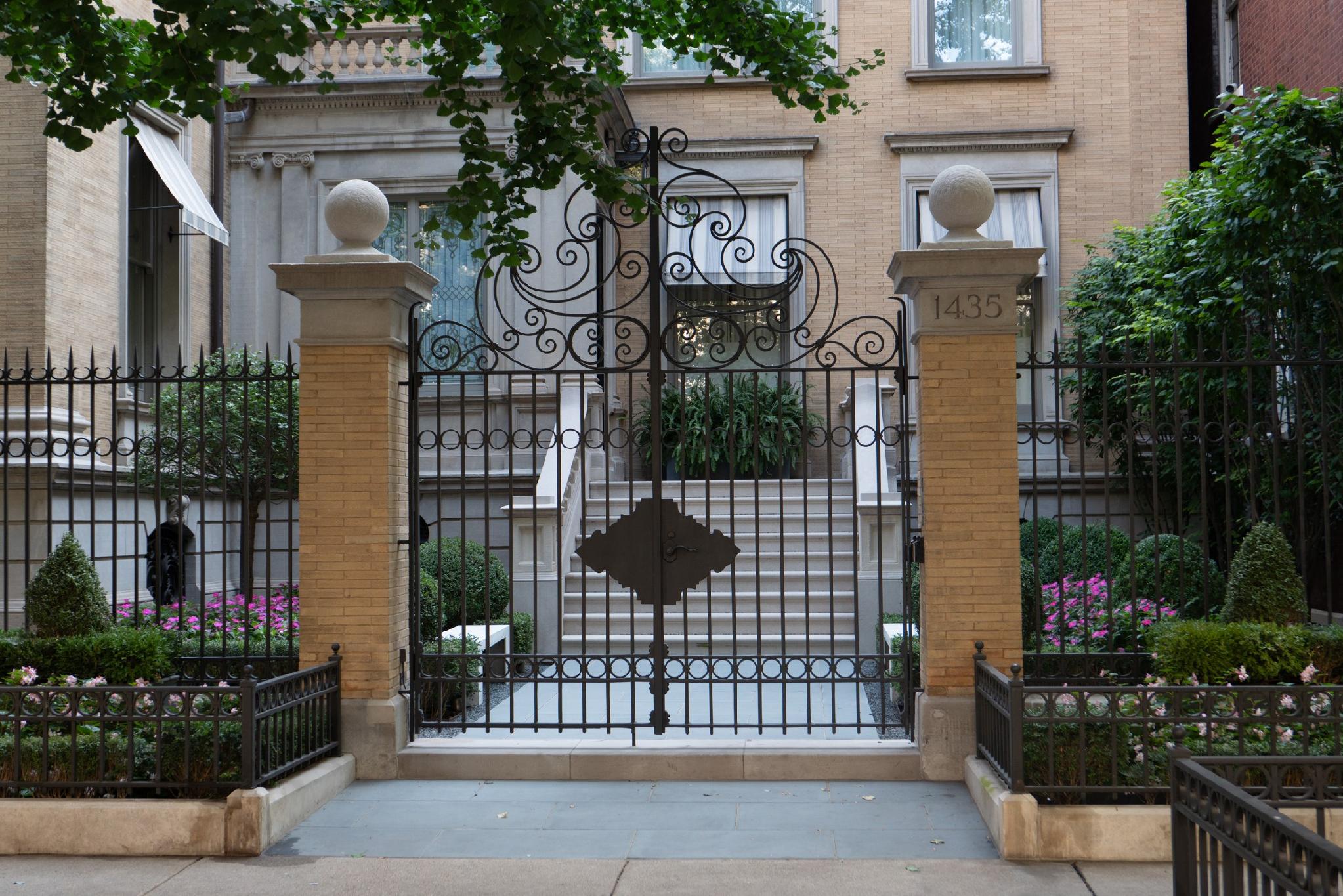 The neighboring gate at 1435 N Astor Street